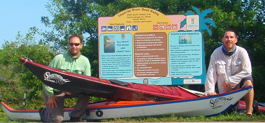 Jeff Fabiszewski and Sean Fitzgibbon beside sea kayaks at Imperial River Boat Ramp in Bonita Springs, Florida, September 29, 2011.