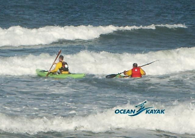 Jeff and Greg practice paddling in surf